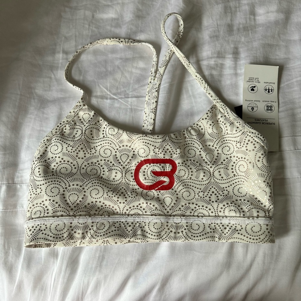 CycleBar branded gold Glyder bra